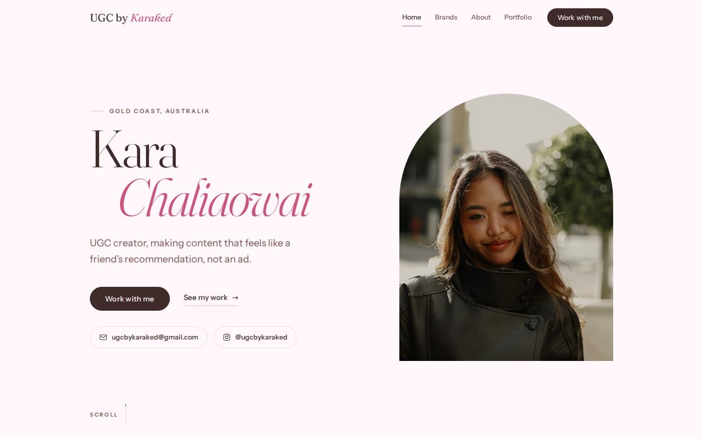 UGC by Karaked home page on desktop: the name “Kara Chaliaowai” in a light serif, “Chaliaowai” in pink italic, beside an arch-topped portrait of Kara, with a Work with me button, a See my work link, and email and Instagram links.