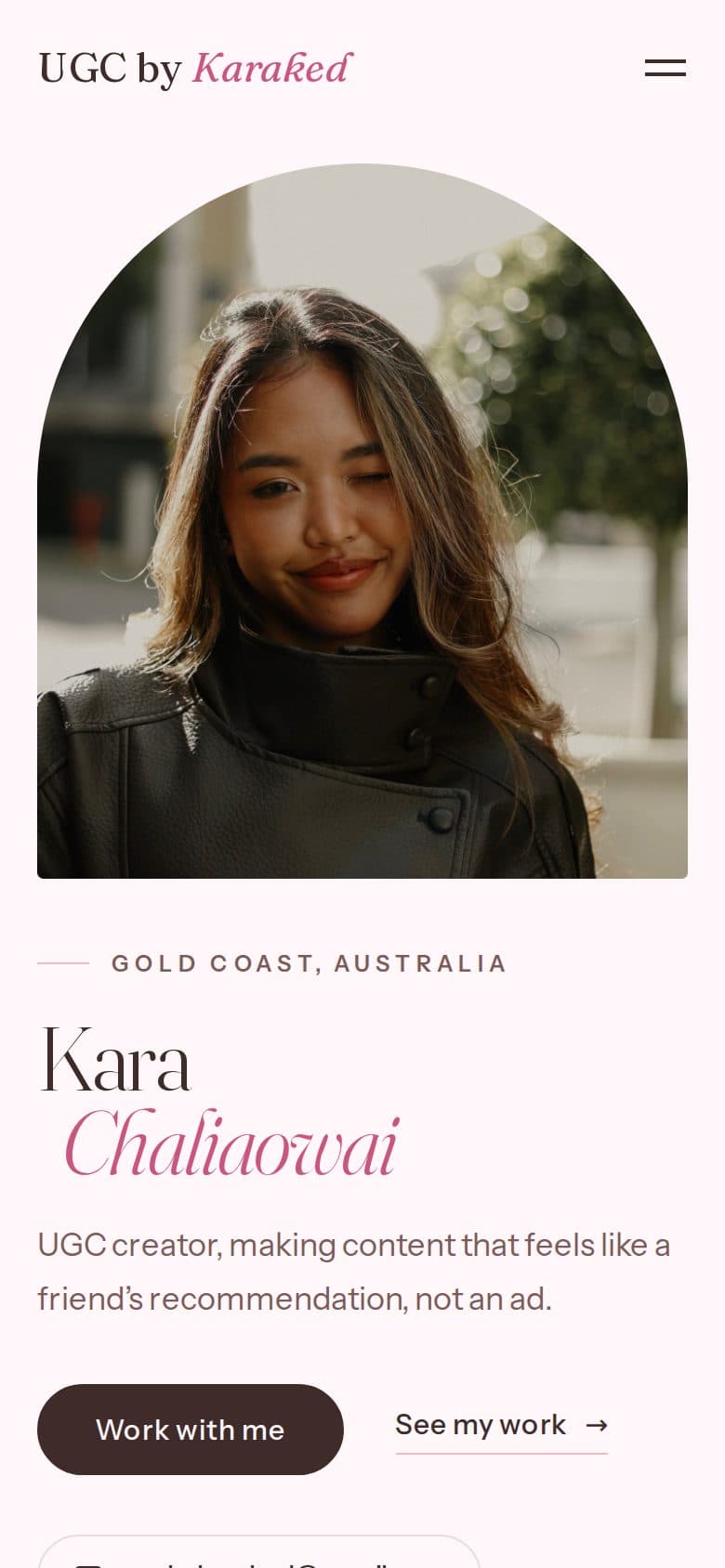 UGC by Karaked home page on a phone: the arched portrait above her name and her one-line intro, with the Work with me button under them.